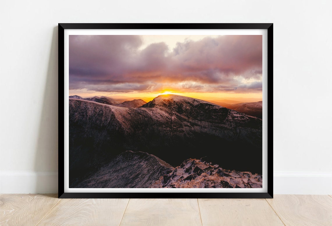 Dramatic Sunrise Over Dark Mountain Peaks Golden Clouds Poster
