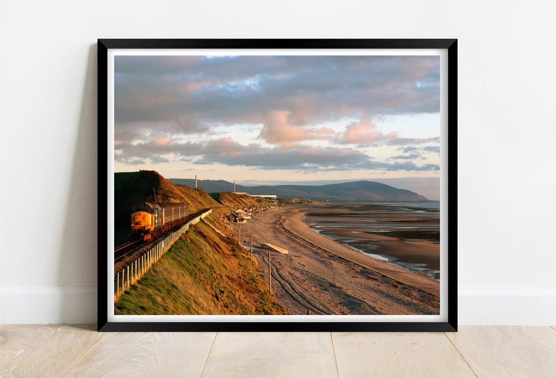 Braystones Beach Train Running Along Cumbria Coastline Poster