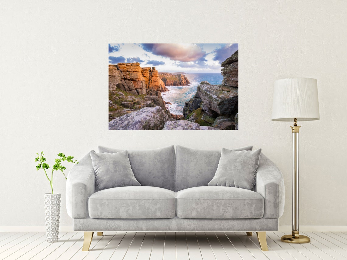 Towering Granite Sea Cliffs Bathed in Warm Golden Light Poster - Image 2