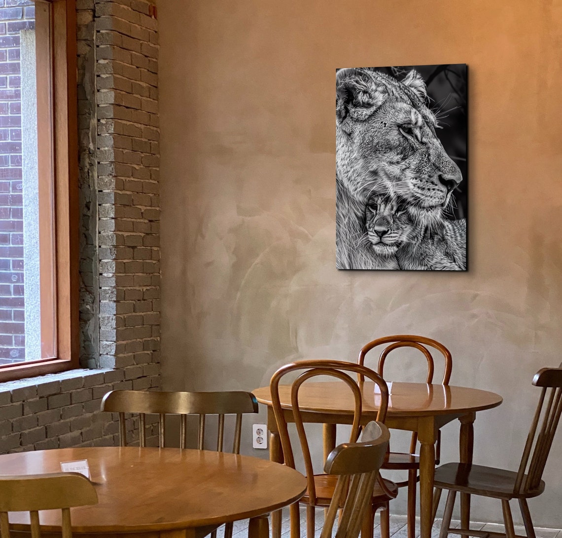 Black and White Lioness Holding Her Cub Close Wildlife Poster - Image 7