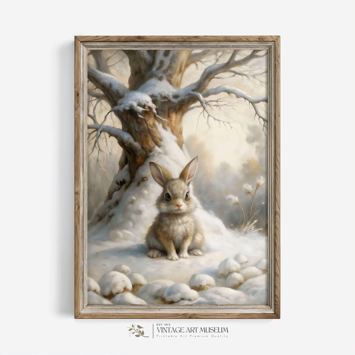 Little Bunny Sitting in Fresh Snow Beneath a Snow Laden Tree Poster