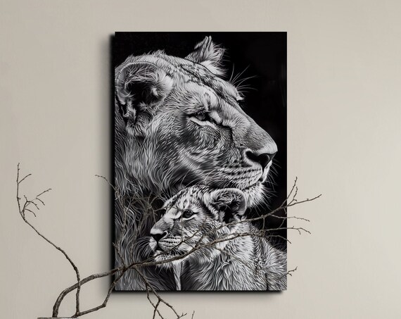 Black and White Lioness and Cub in Profile Beside Branches Poster