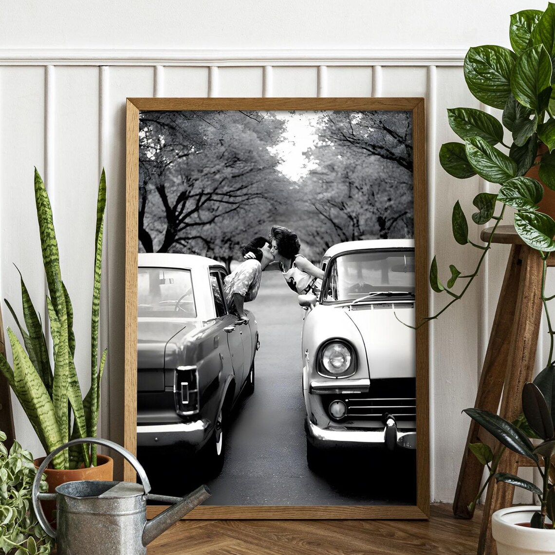 Vintage Couple Kissing Between Classic Cars Black and White Poster