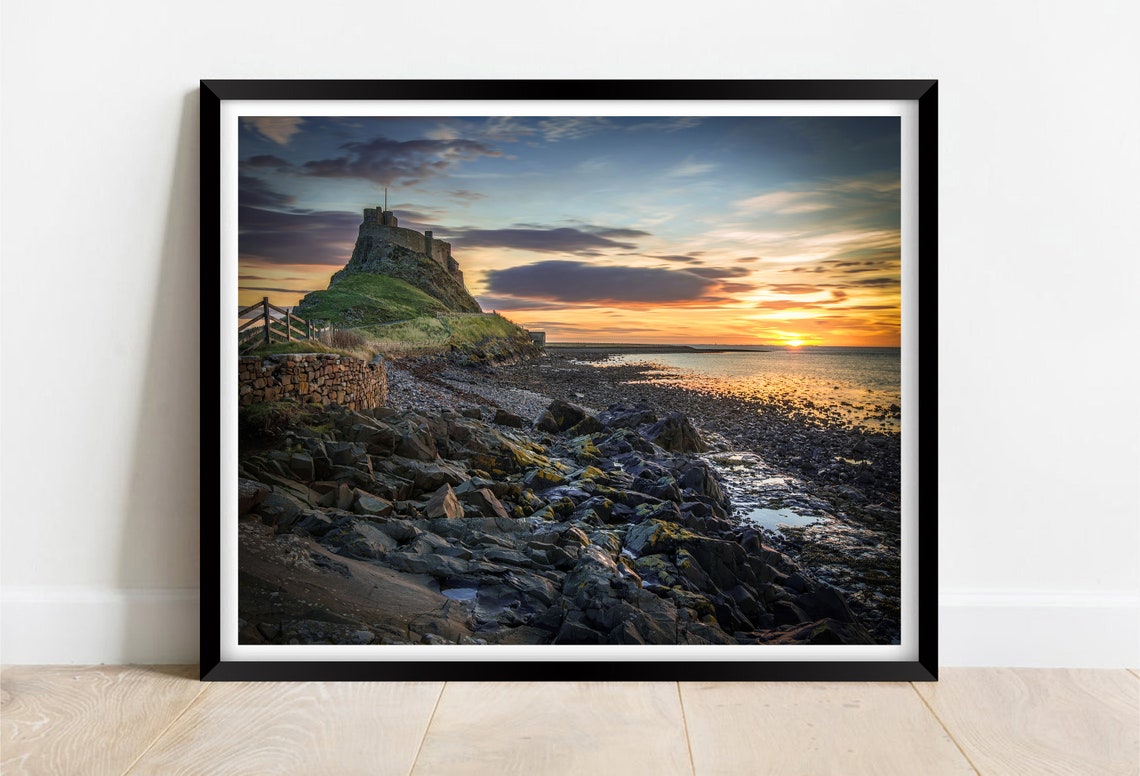 Lindisfarne Castle Holy Island At Sunset Over Rocky Shore Poster