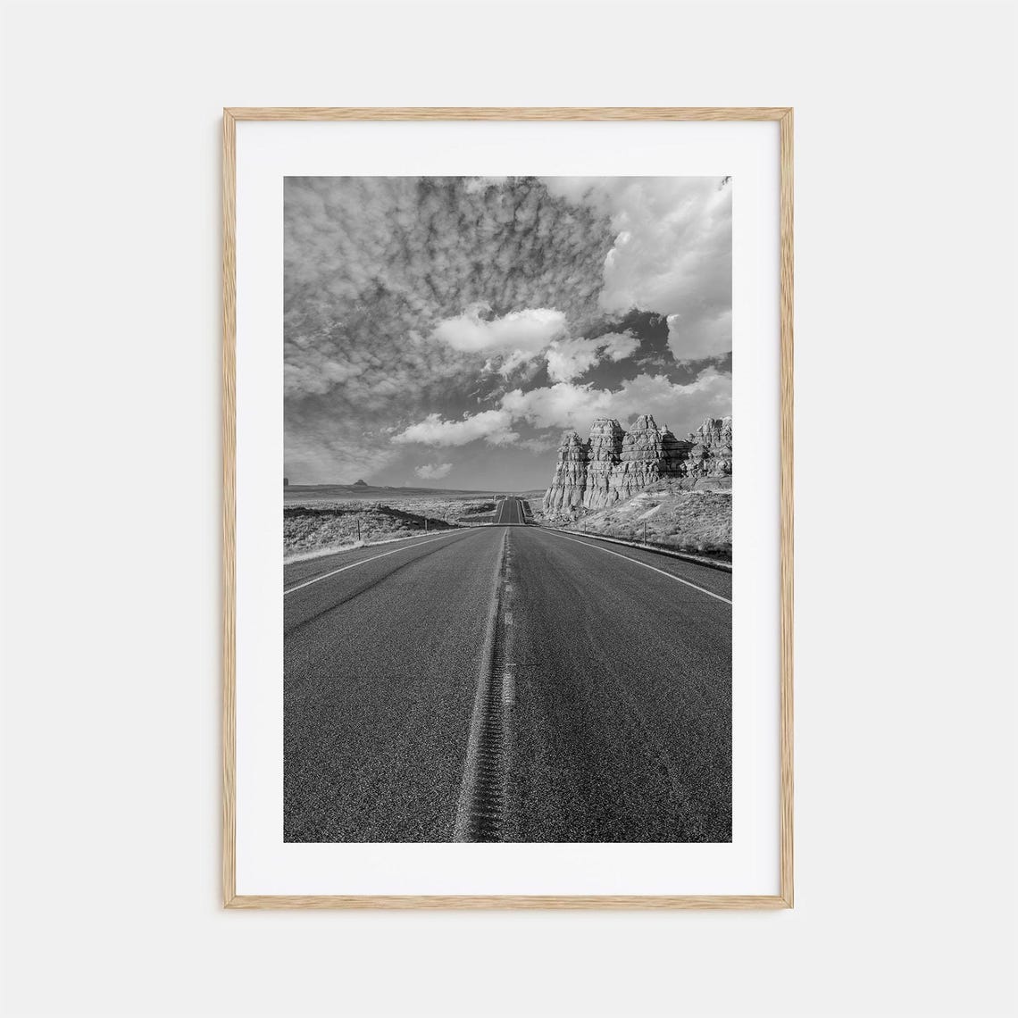 Desert Highway Toward Rock Formations Black And White Poster