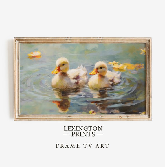 Two Ducklings Swimming on an Autumn Pond with Golden Leaves Poster