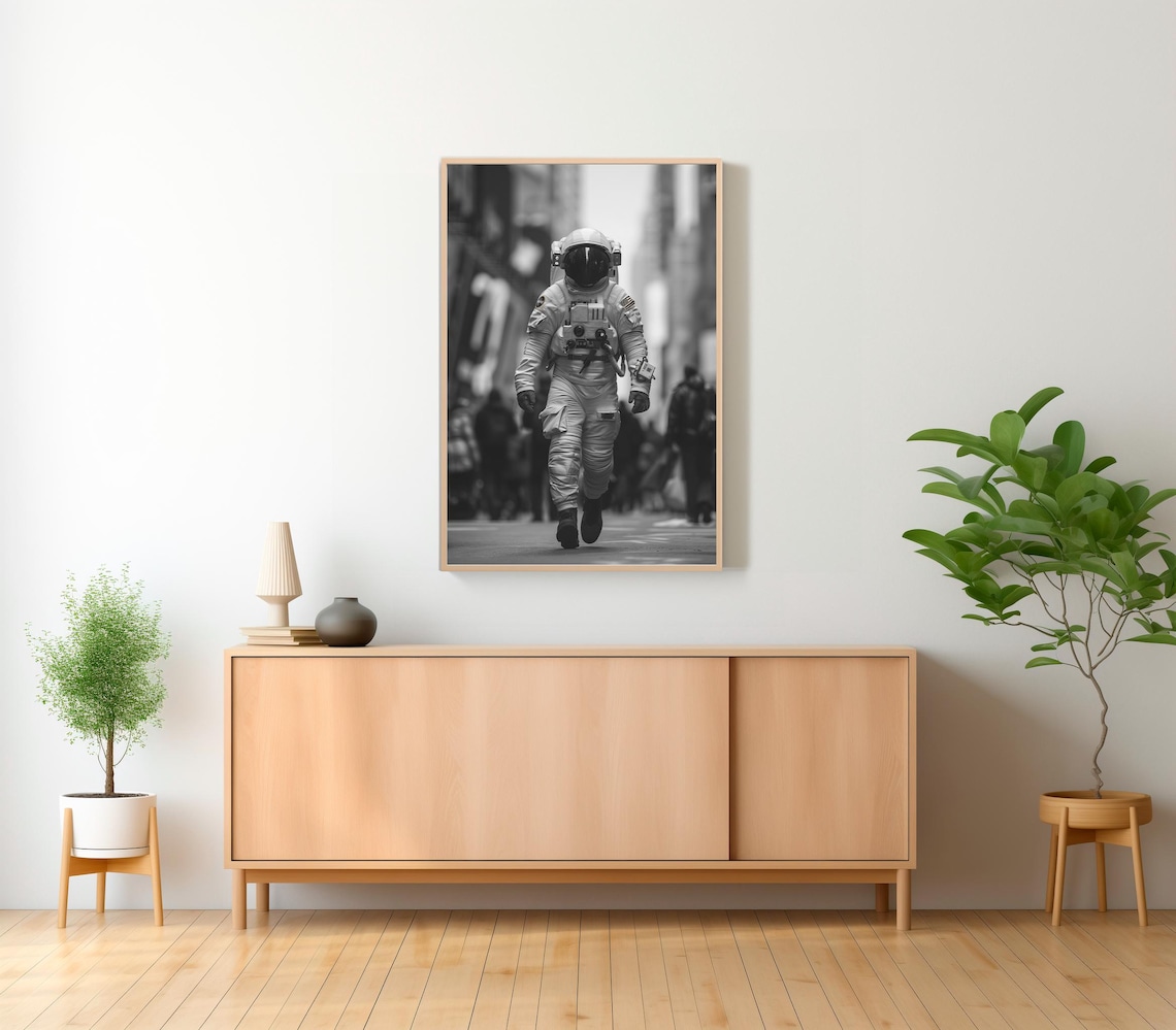 Astronaut Walking Down a Busy City Street Black and White Photo Poster - Image 2