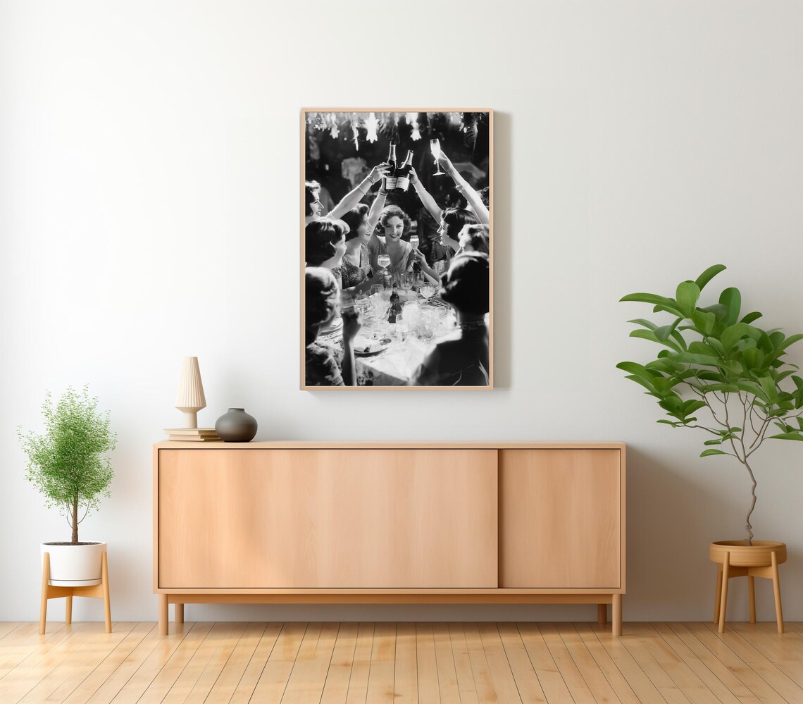 Women Raising Champagne Bottles in Celebration Black and White Poster - Image 2