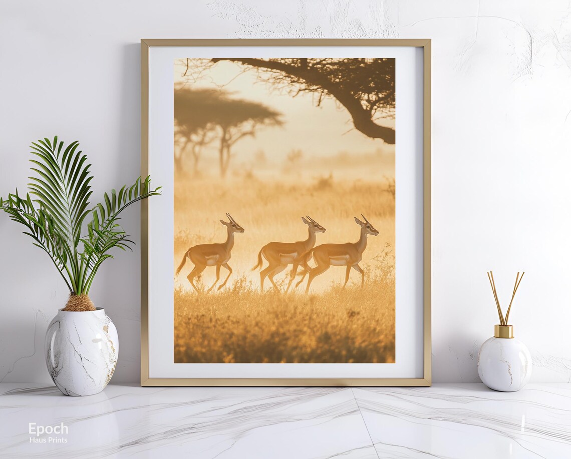 Three Gazelles Running Across A Golden Sunrise Savanna Print - Image 2
