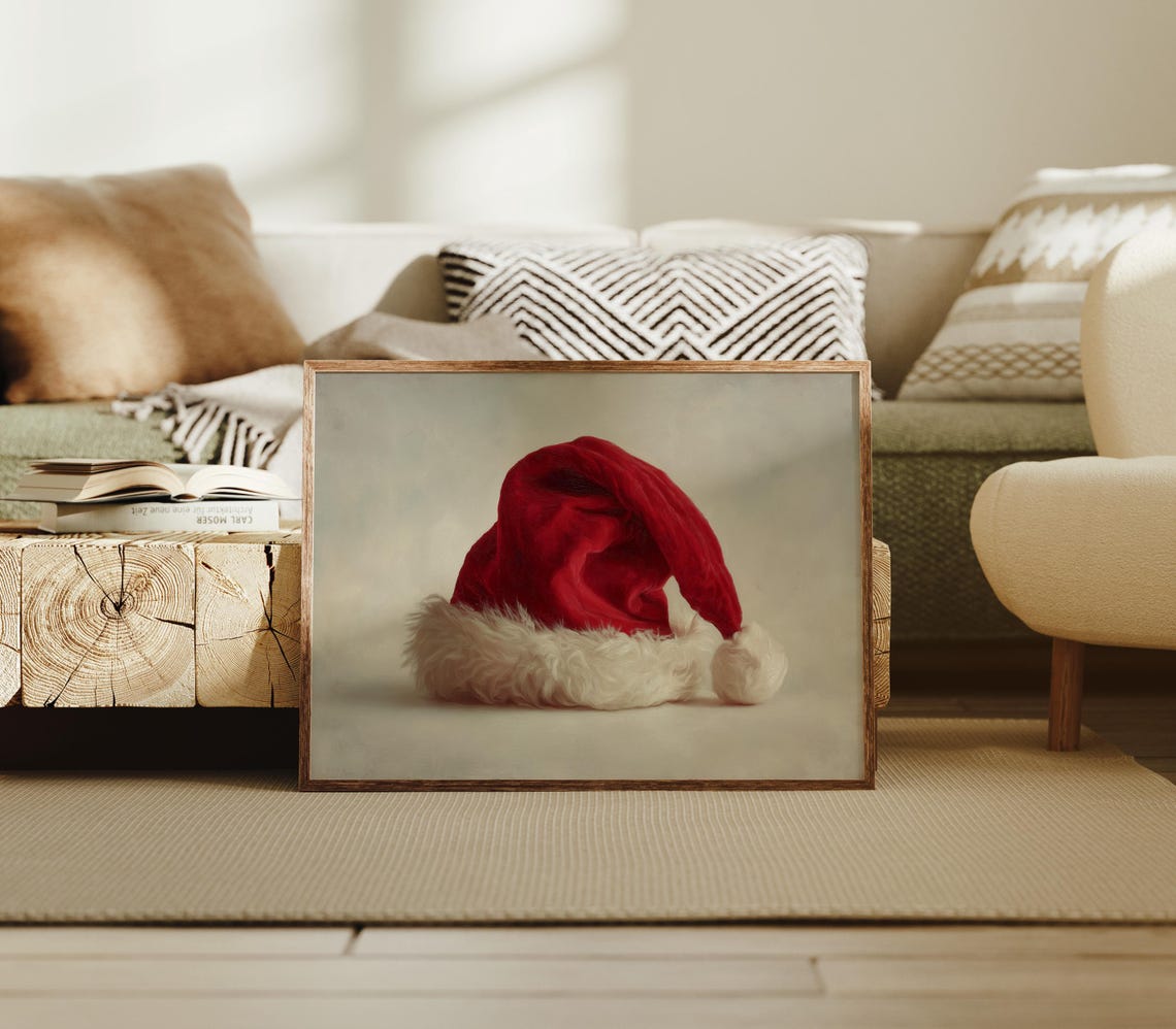 Classic Red Santa Hat With White Fur Trim On Neutral Backdrop Poster