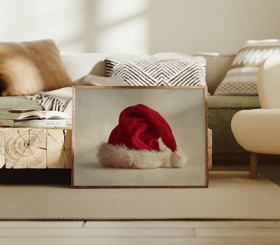 Classic Red Santa Hat With White Fur Trim On Neutral Backdrop Poster