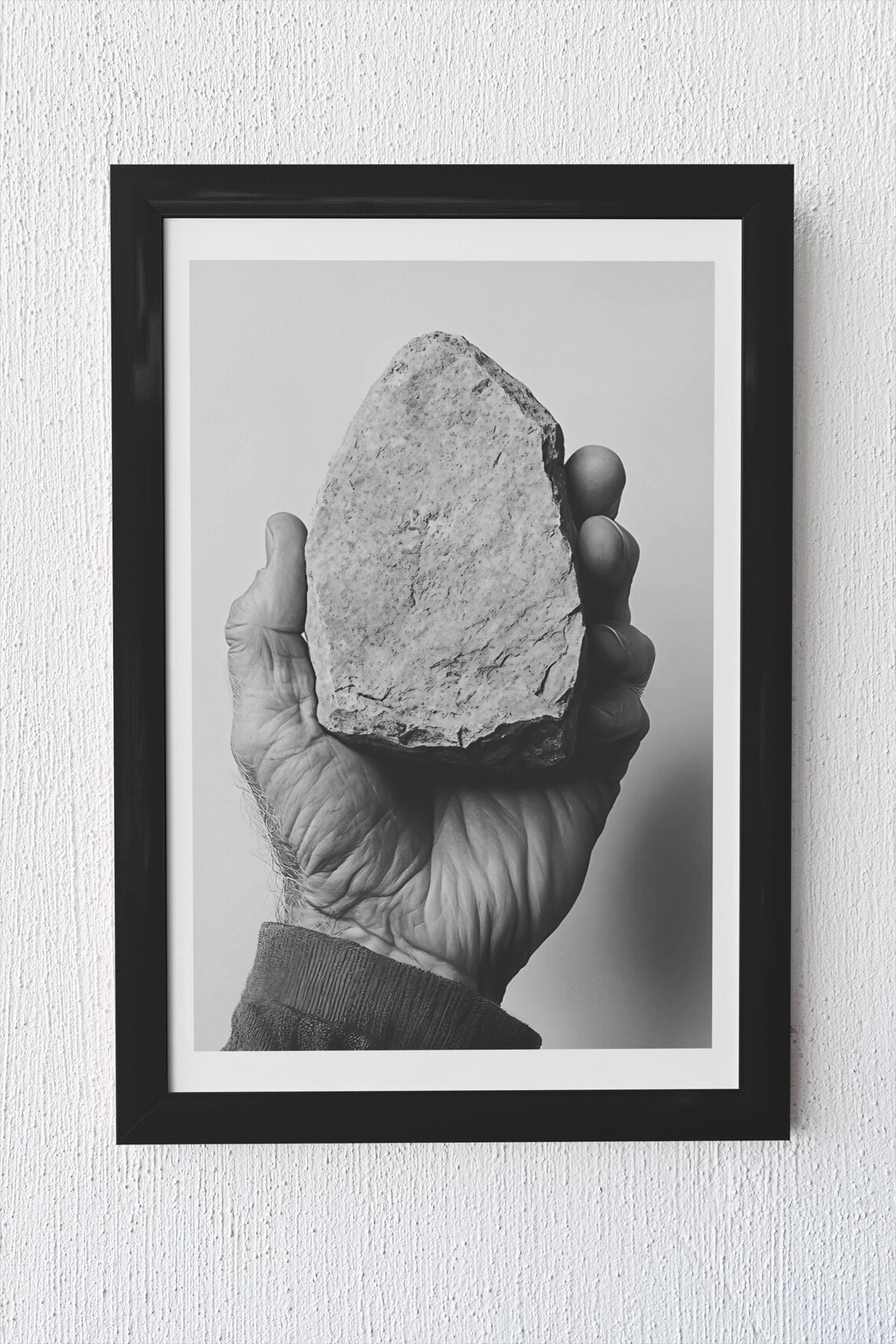 Minimalist Black And White Hand Holding Stone Photo Art Poster - Image 4