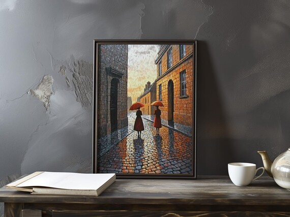 Two Women With Red Umbrellas on a Rainy Cobblestone Street Poster