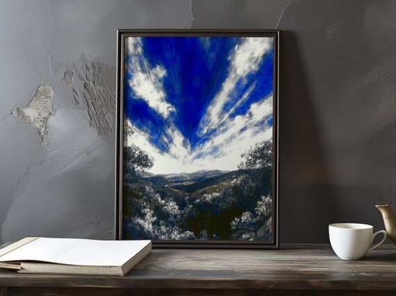 Deep Blue Sky Opening Over A Dark Mountain Forest Valley Poster