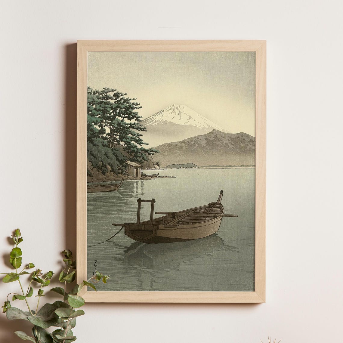 Snowy Mount Fuji Above Winter Lake with Wooden Rowboat Poster