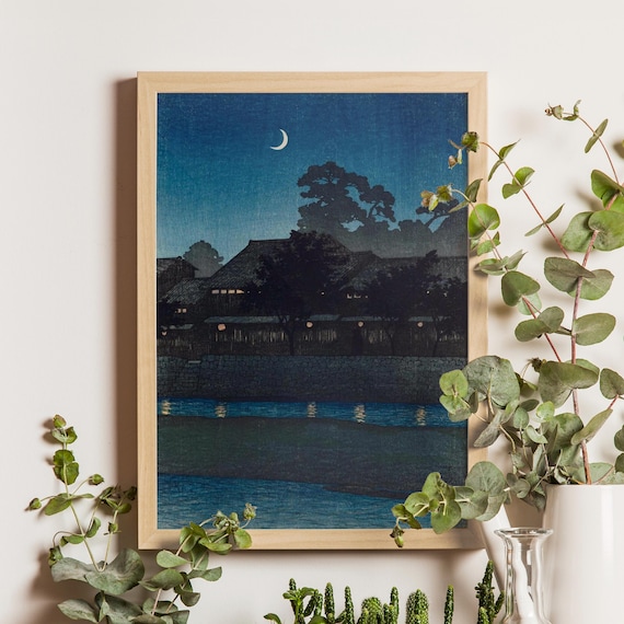 Crescent Moon Over Dark Riverside Town with Glowing Lanterns Poster