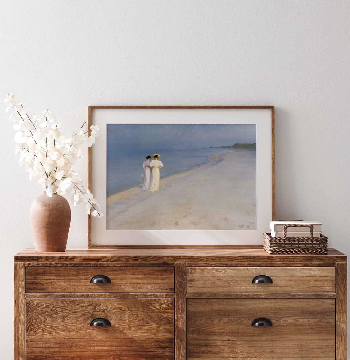 Two Ladies in White Dresses Strolling on a Sandy Beach Poster - Image 4