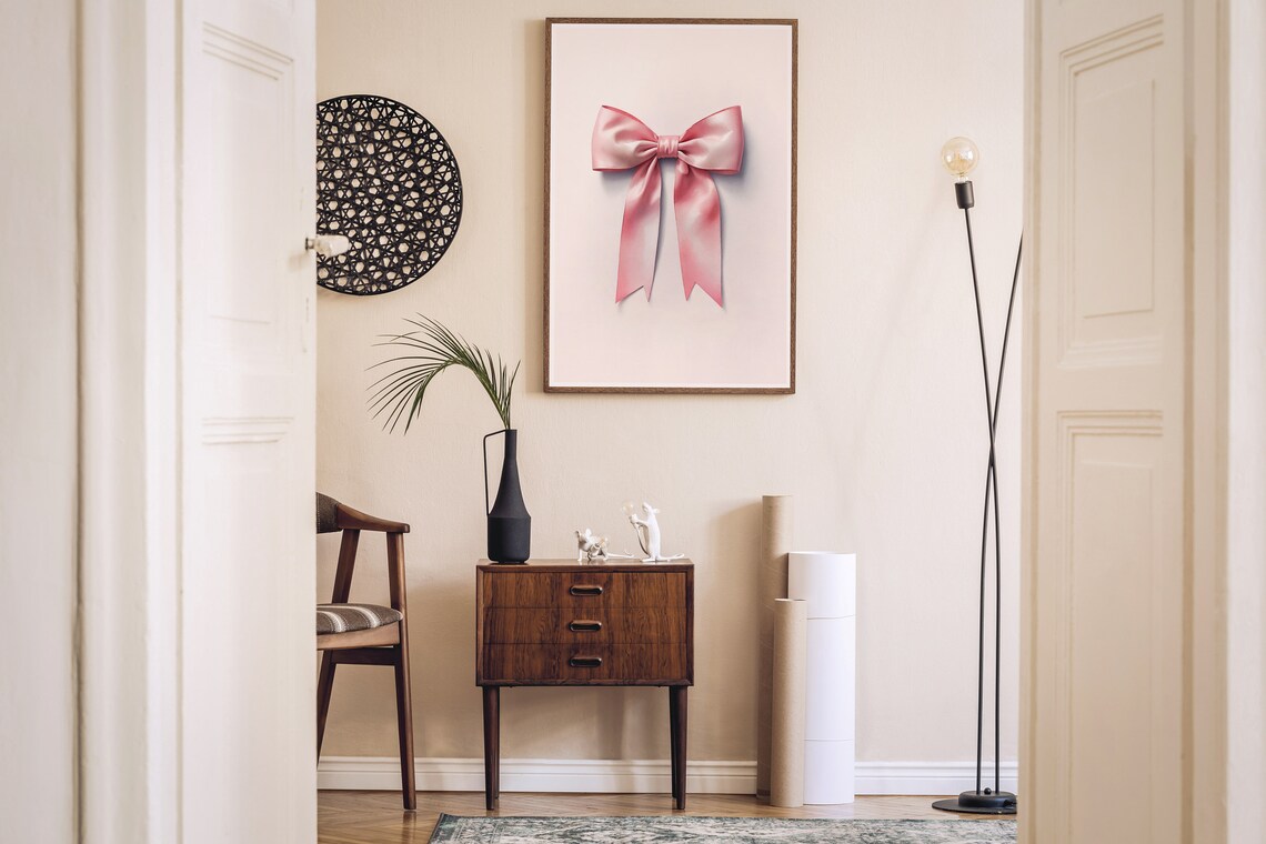Glossy Pink Satin Ribbon Bow Framed Print In A Modern Living Room