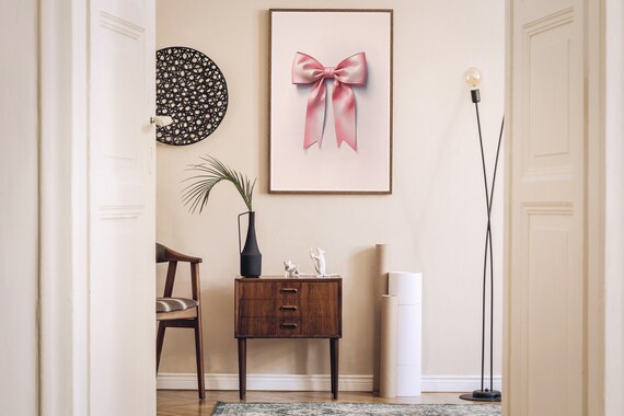 Glossy Pink Satin Ribbon Bow Framed Print In A Modern Living Room