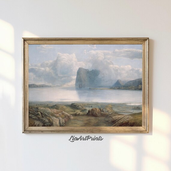 Tranquil Misty Coastline with Rocky Shore and Distant Headland Poster
