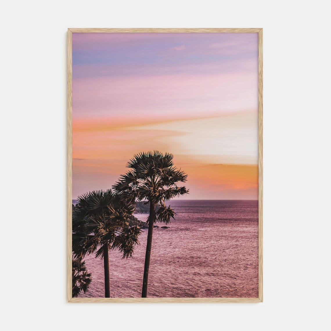 Palm Trees by the Ocean Under a Purple and Pink Sunset Poster