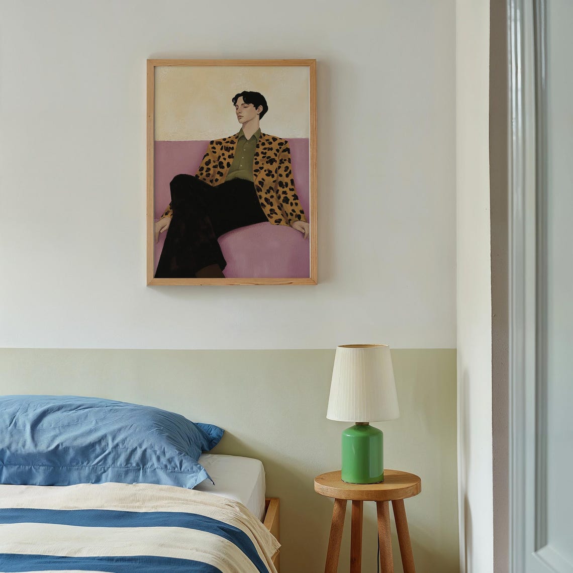 Stylish Man in Leopard Patterned Jacket Lounging on Pink Sofa Poster - Image 2