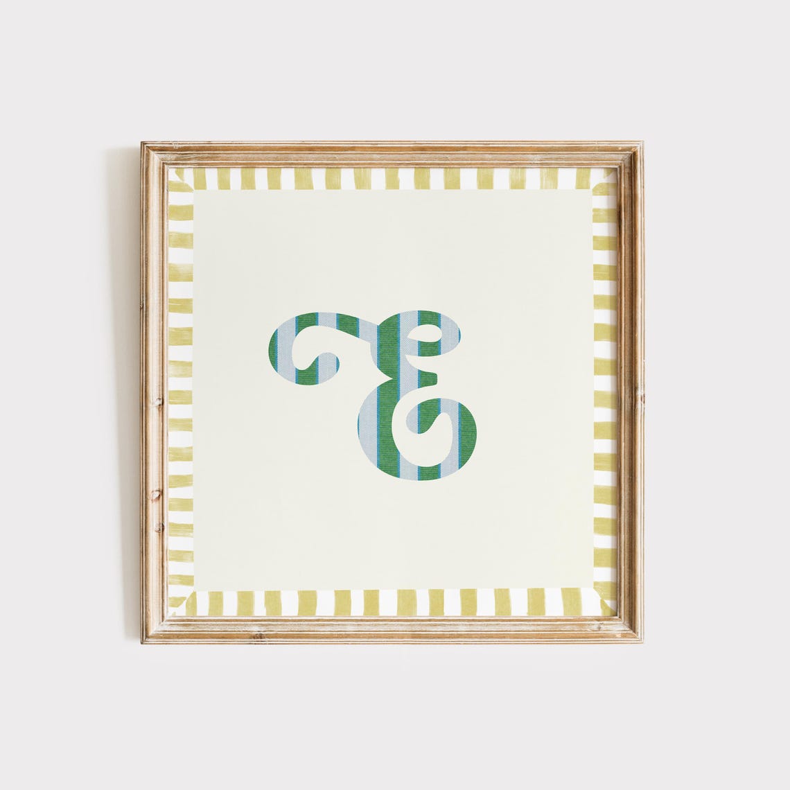 Swash Letter E Green Blue Striped Monogram Cream Framed Art Print