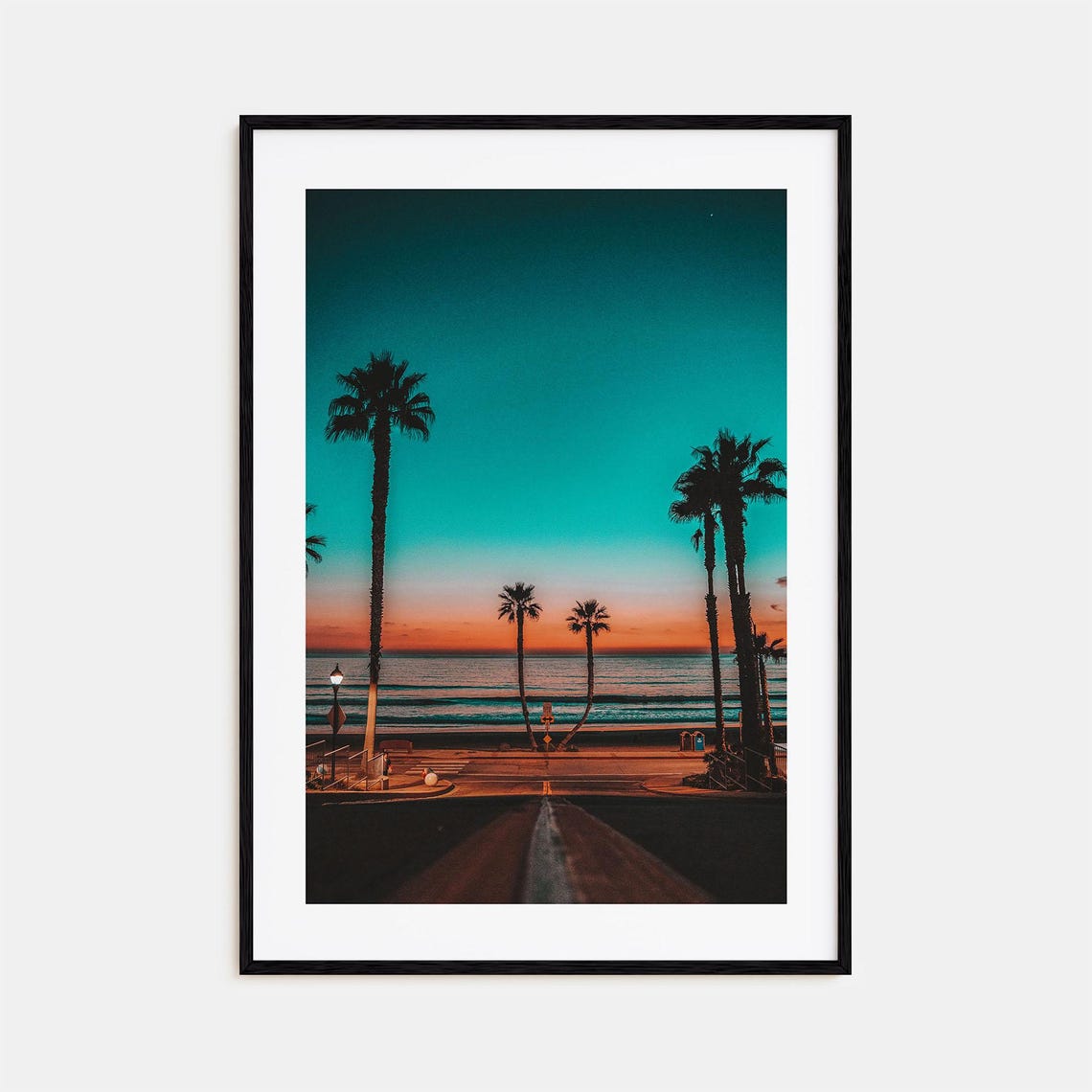 Palm Tree Silhouettes at Sunset Over Ocean Street to Beach Poster
