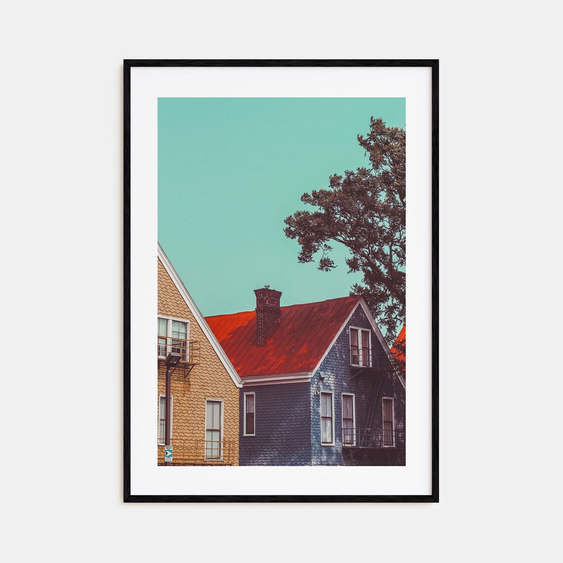 Vintage Brick Townhouses Red Metal Roof Against Teal Sky Poster