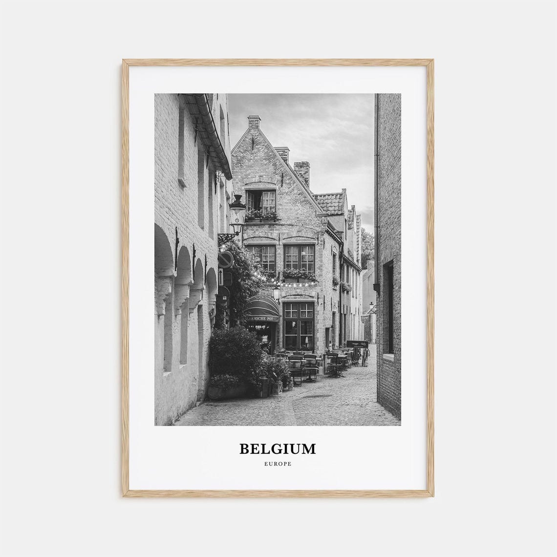 Charming Belgian Cobblestone Street With Old Corner Café Travel Poster