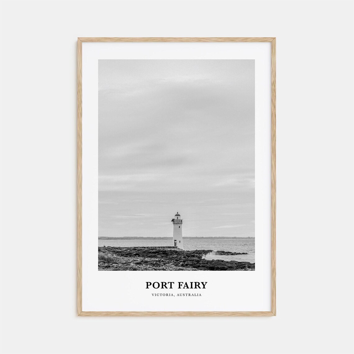 Port Fairy Australia Lone Lighthouse On Rocky Shoreline Poster