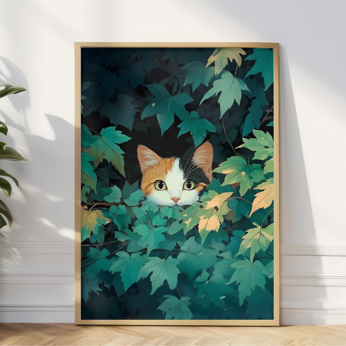 Calico Kitten Peeking Through Green Leaves Cute Cat Portrait Poster