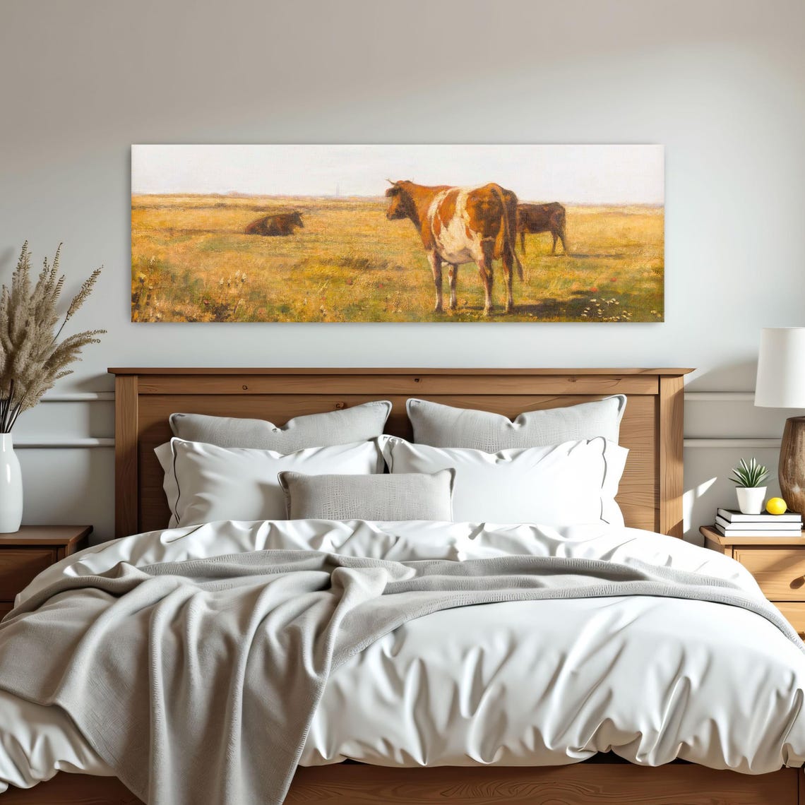 Cows Resting and Grazing in a Golden Field Under a Pale Sky Poster