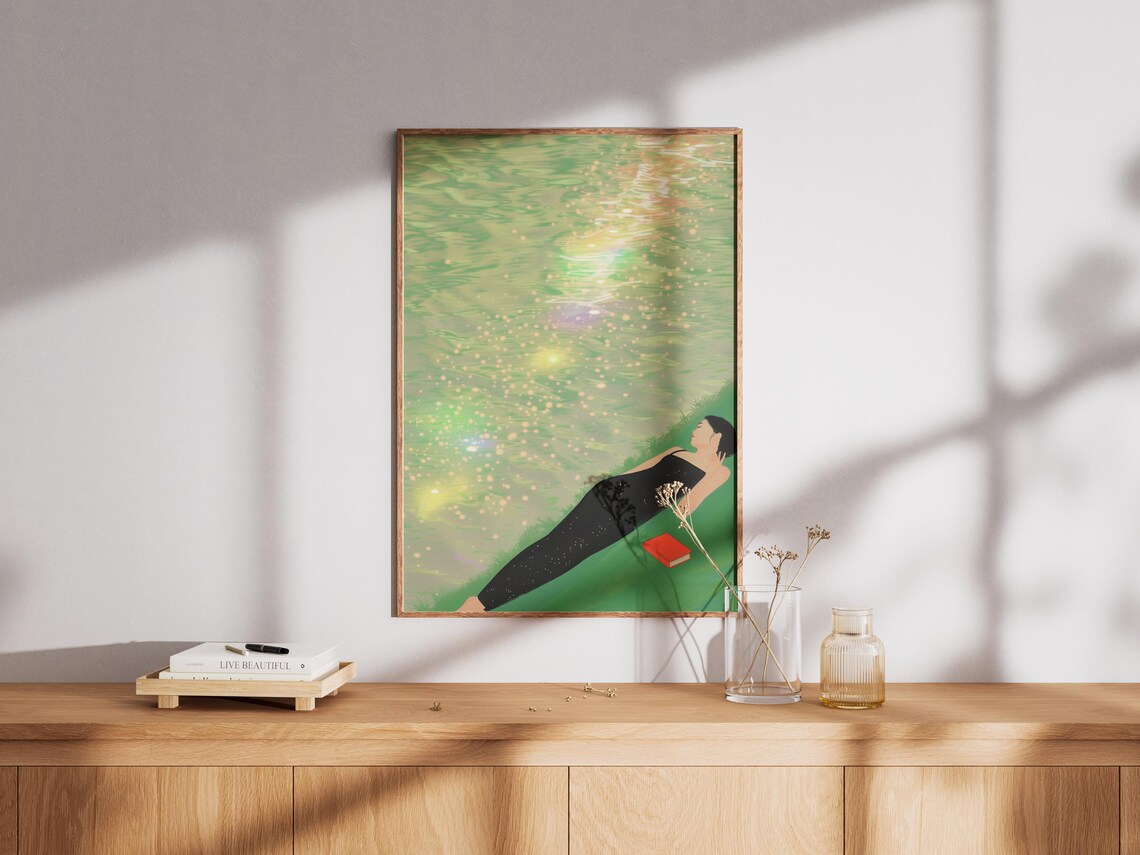 Woman in Black Dress Floating on Sparkling Green Water Art Print