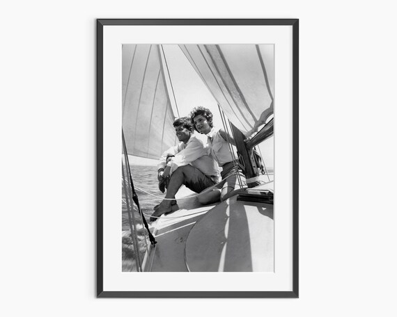 John F Kennedy And Jacqueline Kennedy Sailing Black And White Poster