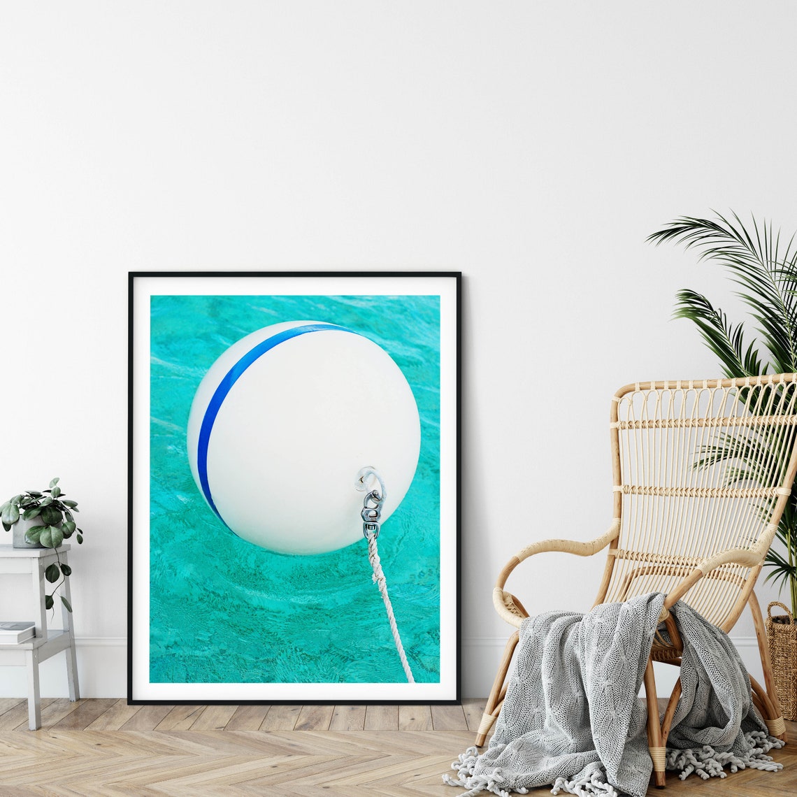 White Buoy with Blue Stripe Floating on Turquoise Water Poster - Image 2