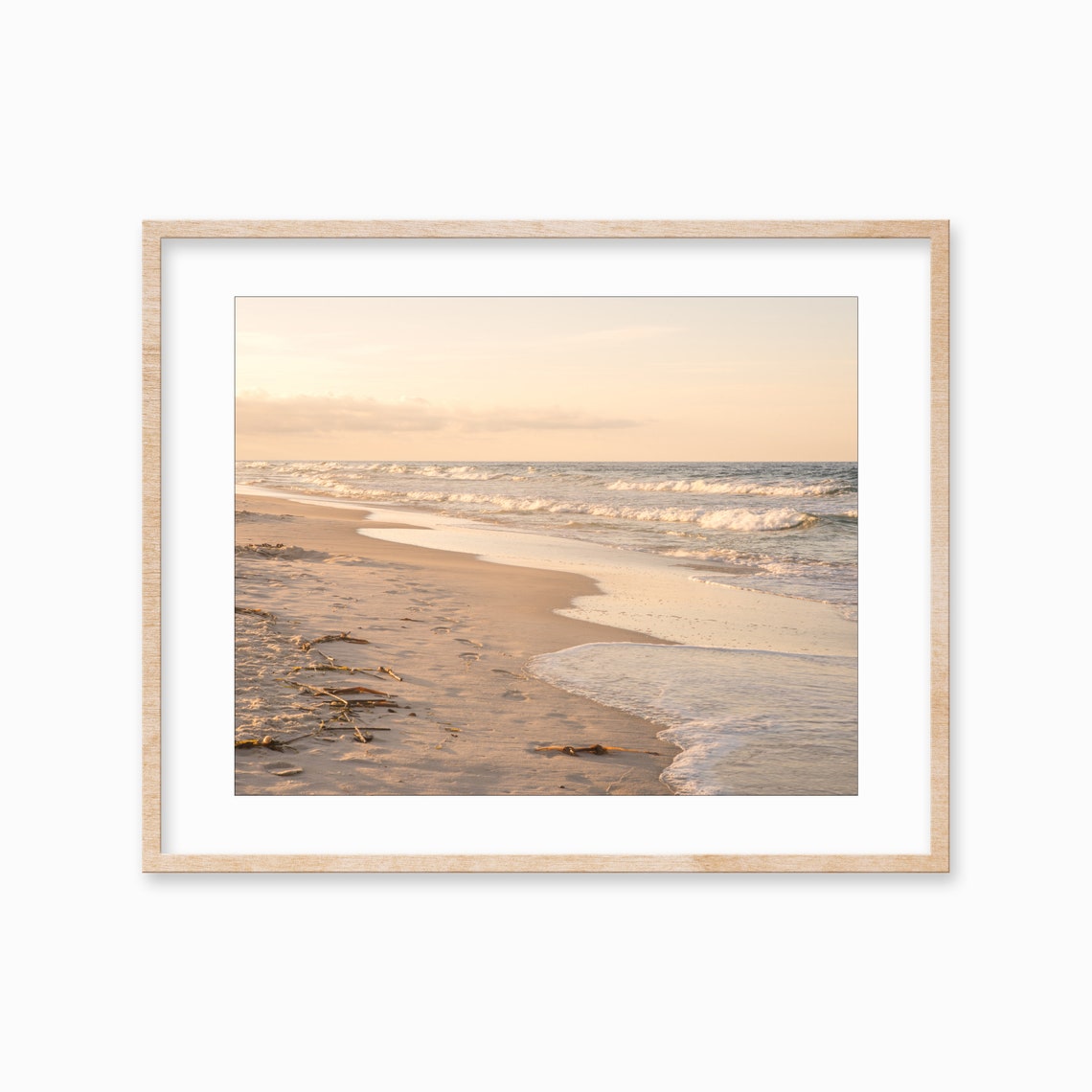 Golden Sunset Over a Calm Beach Shoreline with Soft Waves Poster