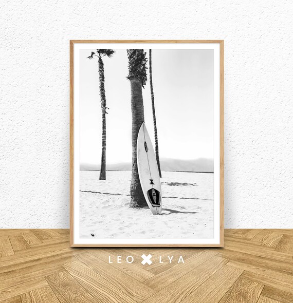 Black and White Surfboard Leaning on Palm Trees Beach Photo Poster
