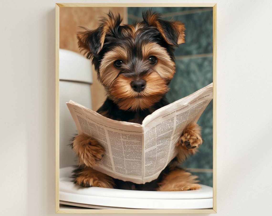Yorkshire Terrier Puppy on the Toilet Reading Newspaper Poster