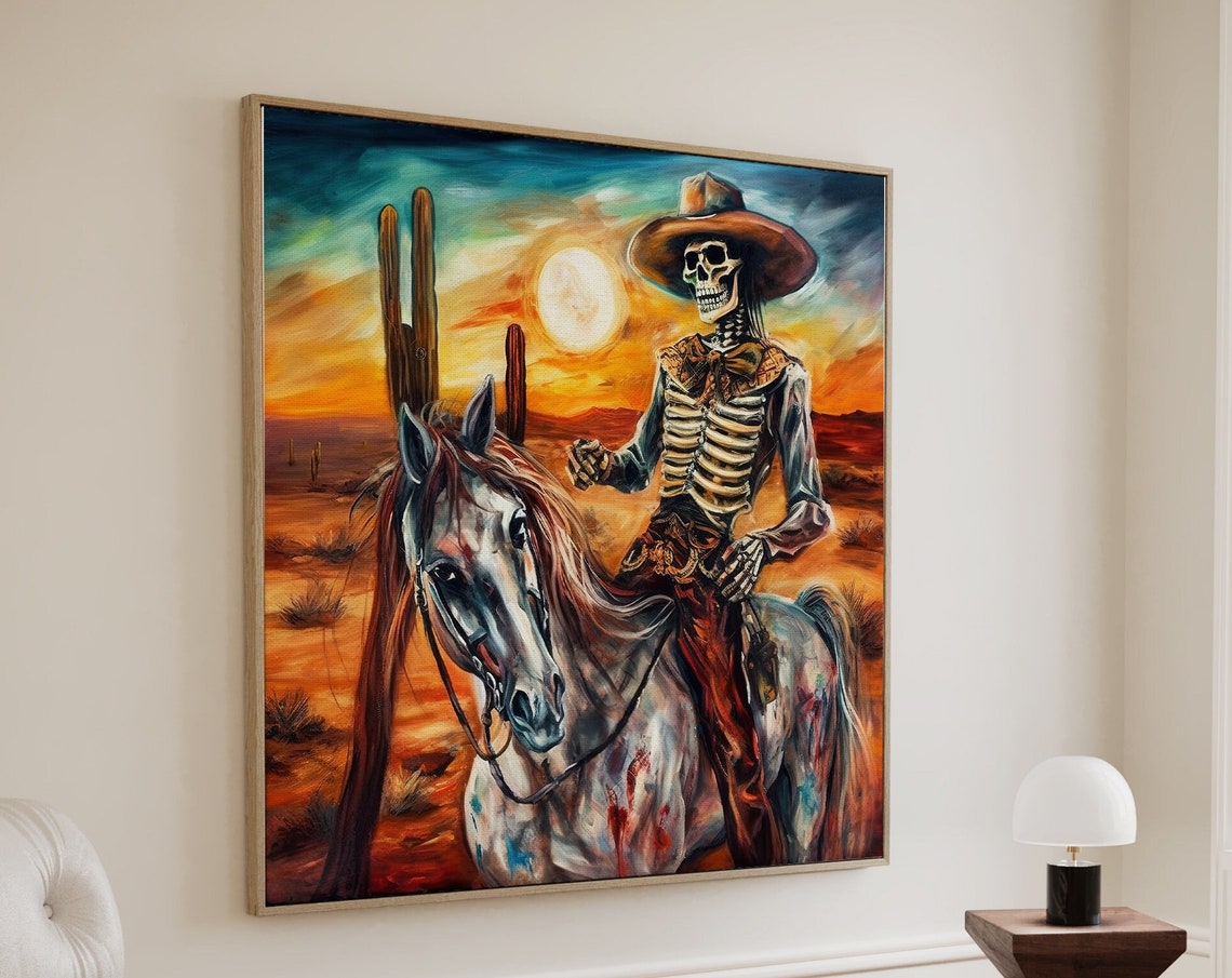 Skeleton Cowboy Riding a White Horse Through Desert Sunset Poster