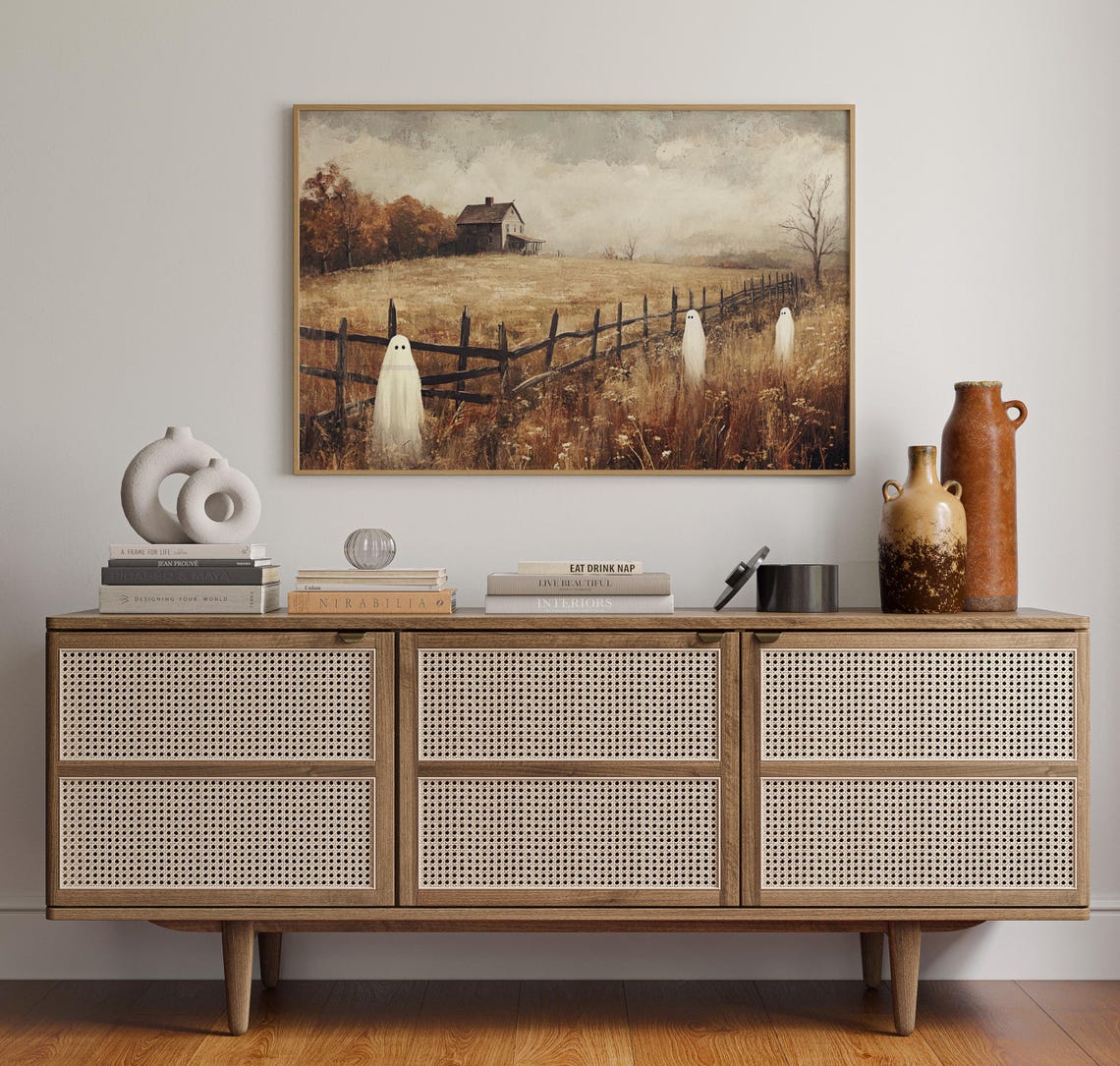 A Haunted Farmhouse With Whimsical Ghosts In An Autumn Field Poster