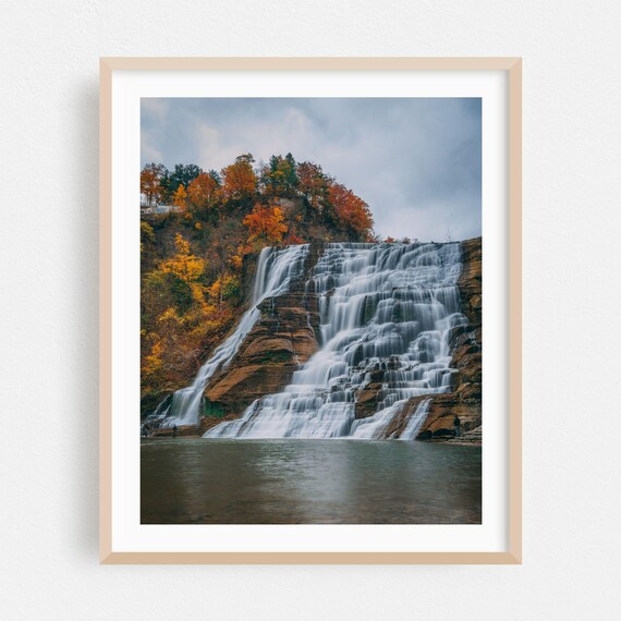 Tiered Waterfall Spilling Over Rocky Cliffs In Autumn Forest Poster