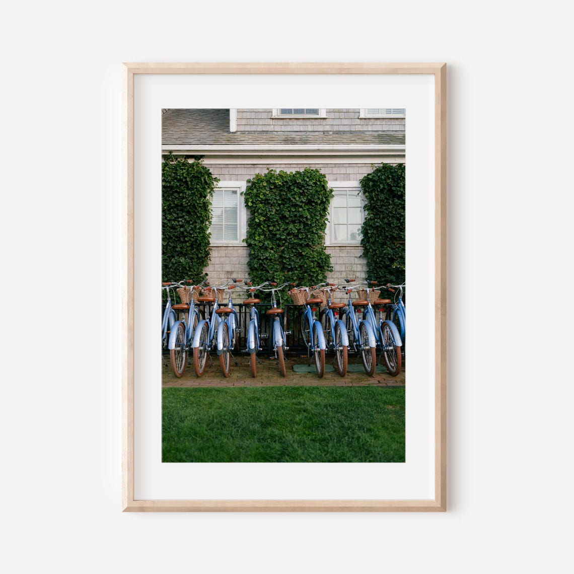 Blue Bicycles With Baskets Against an Ivy Covered Cottage Poster