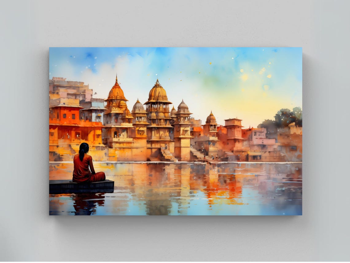 Indian Riverside Temples at Sunrise With Seated Devotee Poster