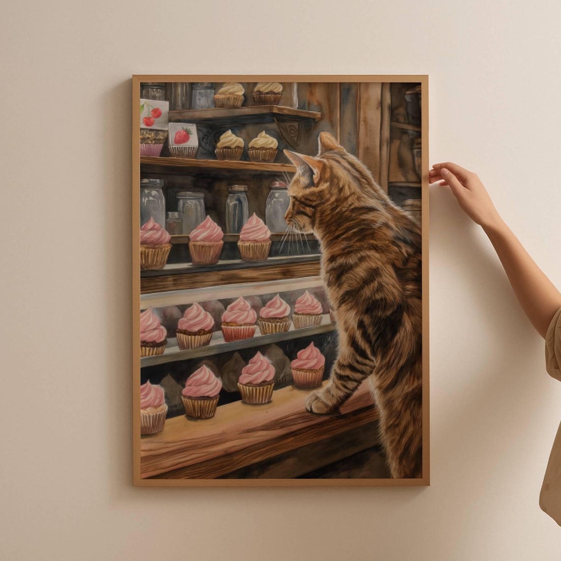 Tabby Cat Gazing at Pink Cupcakes in Bakery Display Watercolor Poster - Image 3