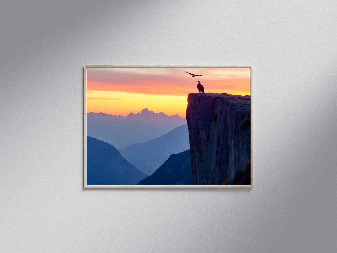 Bald Eagle on a Rocky Cliff Edge Silhouette at Sunset Mountains Poster