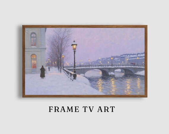 Snowy River Bridge with Glowing Lampposts and Riverside Building Painting Poster