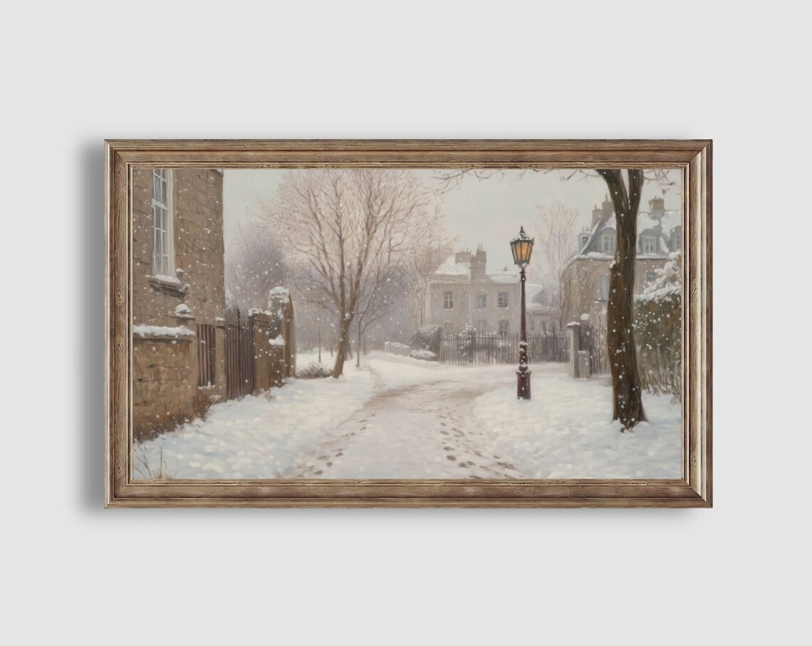 Snowy Stone Street Lamppost Footprints Old Town Winter Scene Poster - Image 2