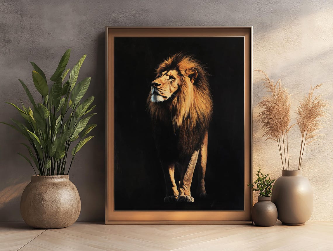 A Male Lion Standing Tall Against a Dramatic Black Backdrop Poster