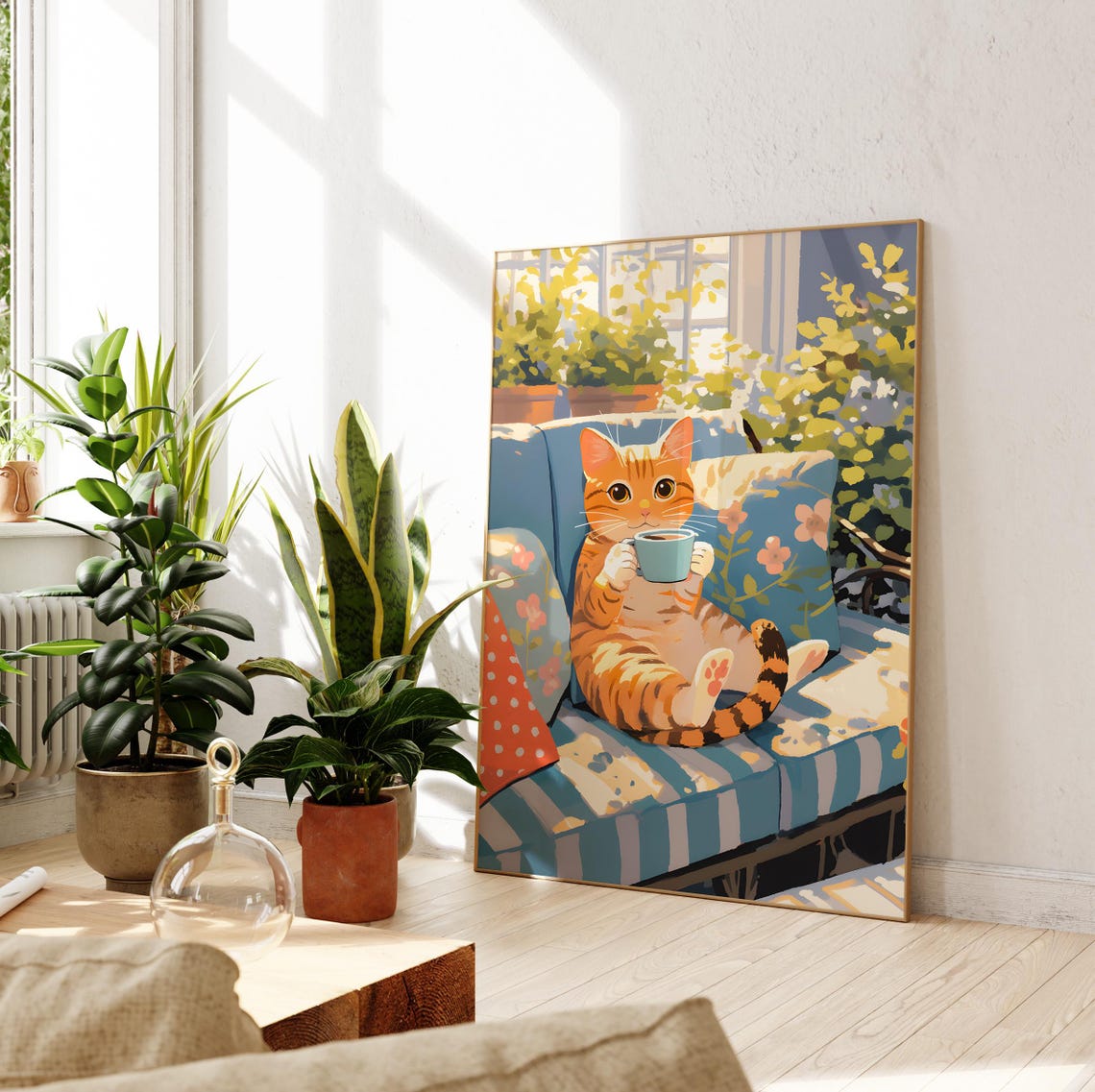 Orange Tabby Kitten Sipping Coffee on a Sunlit Blue Sofa Poster - Image 2
